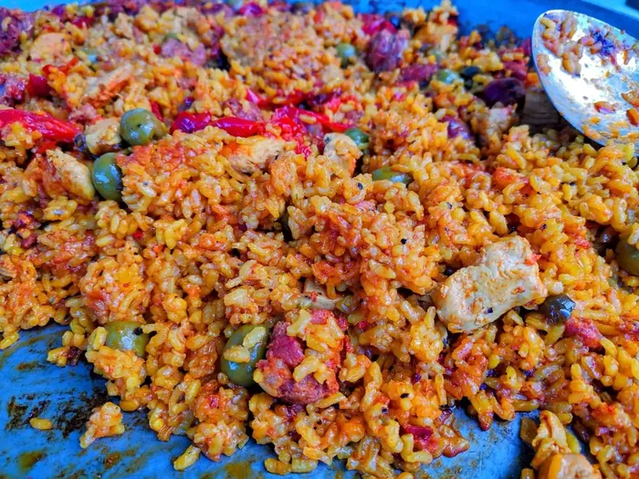Close-up of colourful paella rice and vegetables