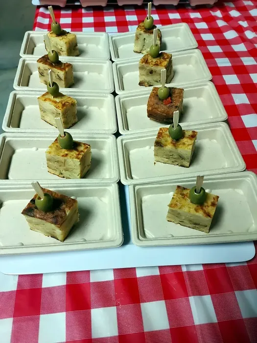 Individual Spanish tapas portions arranged for guests